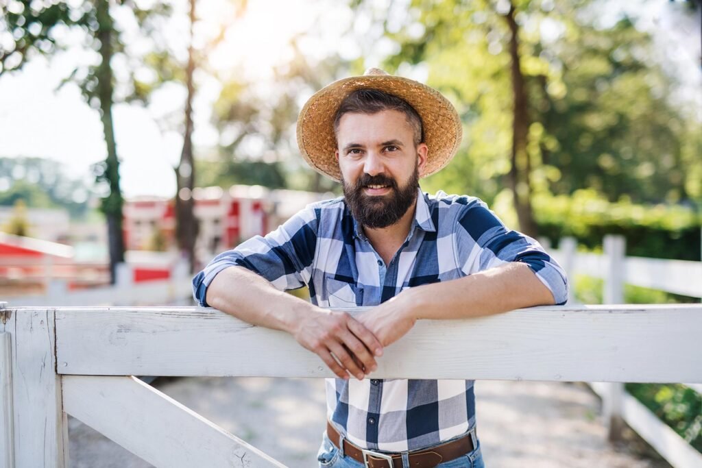 a-portrait-of-mature-man-farmer-standing-outdoors-5QC8E78.jpg