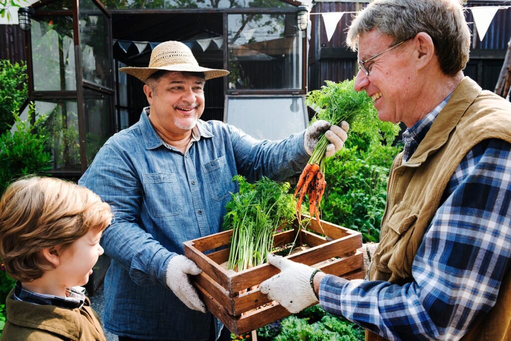 adult-farmer-man-offering-fresh-carrot-CNF4SGJ.jpg