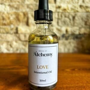 Front view of the Love Intentional Oil by the House of Alchemy, with essential oils, crystals and botanicals, designed for Self-Love, Connection and Compassion